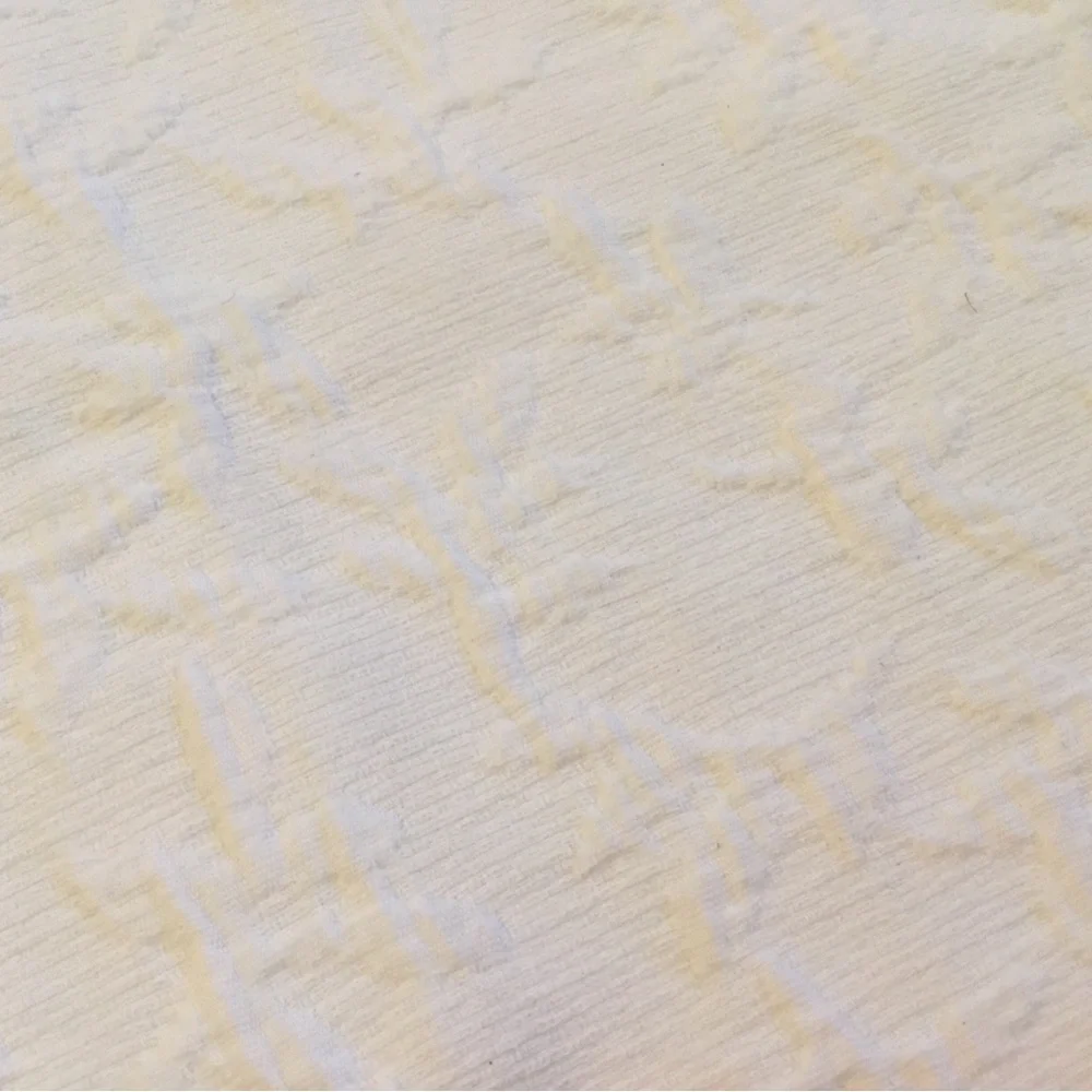 Headboard Slipcover in white matelasse fabric. Slip on. Scalding too